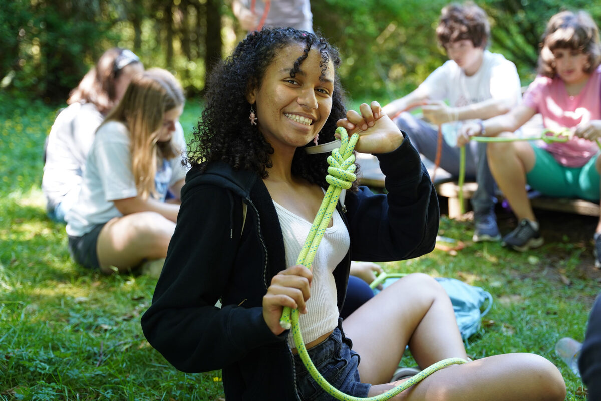 A smiling teen at camp